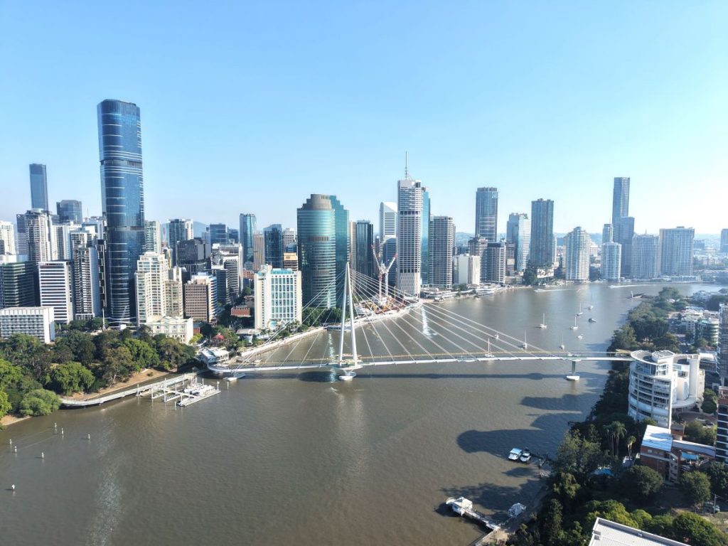 city skyline with buildings and river